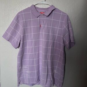 Purple striped adidas Nike polo, some white stains at the bottom of the shirt.